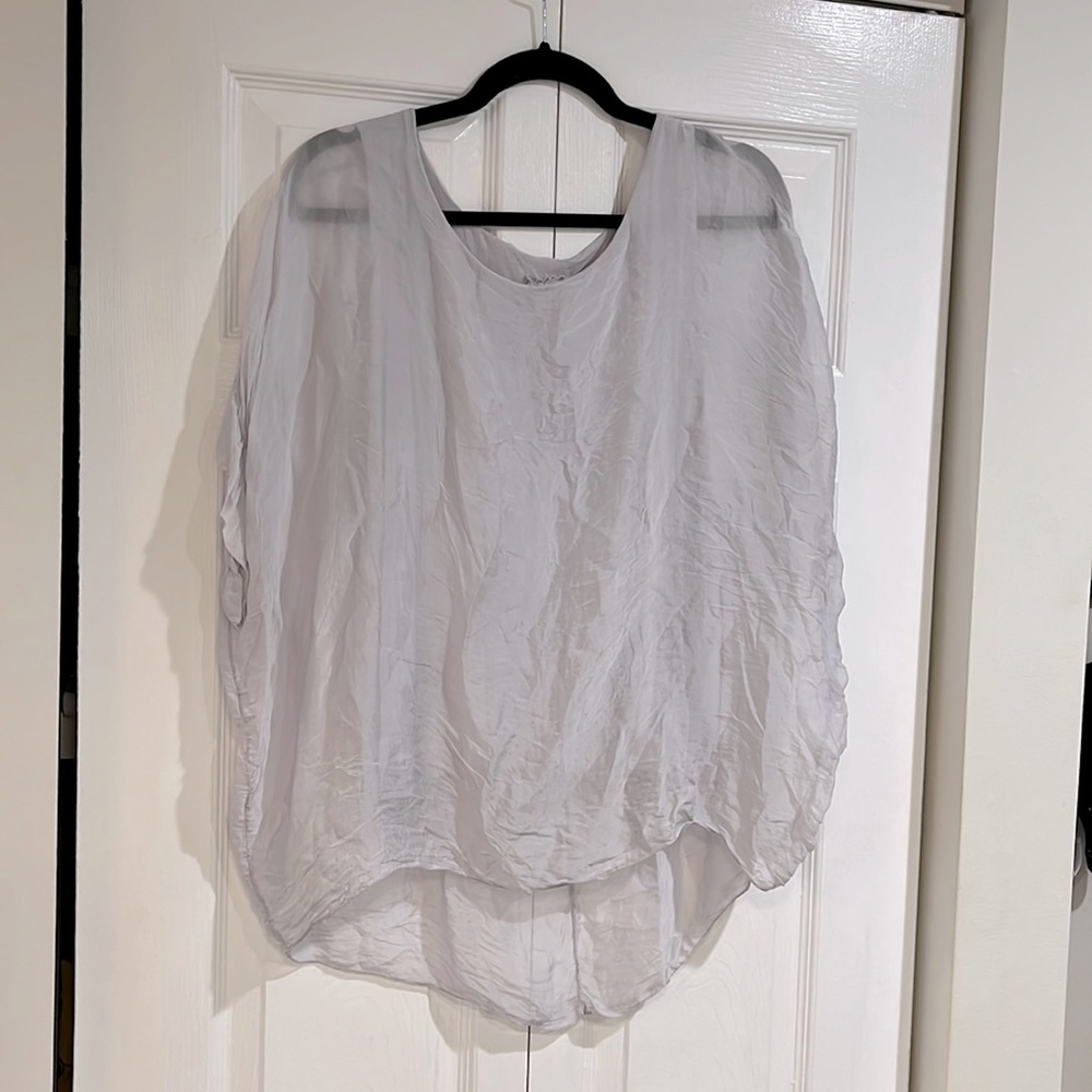 Nice silver shirt with grey slip attached